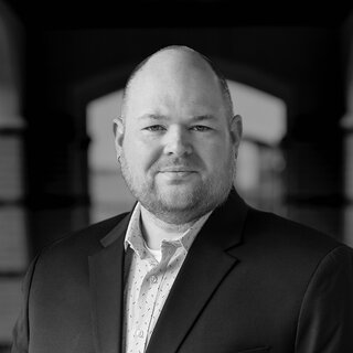 Black and white portrait of Blayne A. Stewart